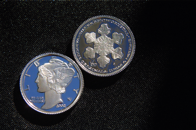 Silver Snow Crystals from 1999 Mintage arranged in a hexagonal pattern.